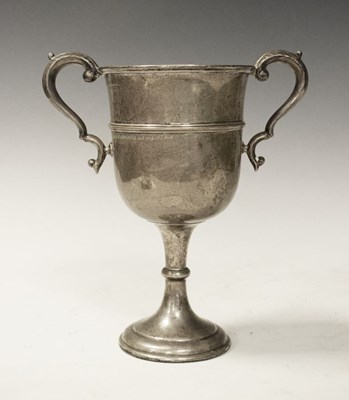 Lot 153 - George V silver trophy with two loop handles and standing
