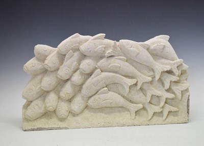 Lot 649 - Carved stone relief panel depicting a shoal of fish