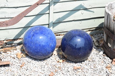 Lot 647 - Pair of glazed blue ceramic garden globes