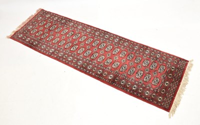 Lot 498 - Two red ground runners