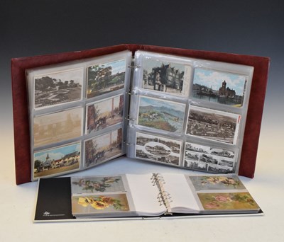 Lot 177 - Four albums of early 20th Century postcards and suitcase