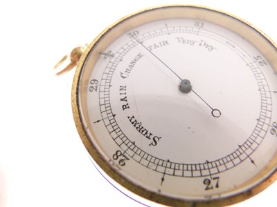 Lot 486 - Gilt metal cased pocket barometer