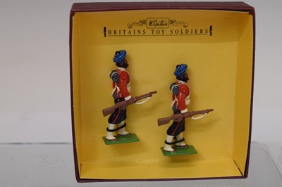 Lot 276 - Britains - The Royal Navy Field Gun Landing Party, and two boxed soldiers