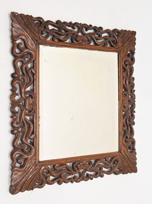 Lot 522 - Carved wooden mirror