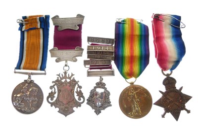 Lot 337 - First World War medal trio, etc