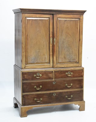 Lot 602 - George III style mahogany linen press