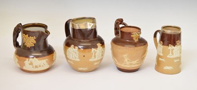 Lot 401 - Four Doulton-Lambeth stoneware jugs