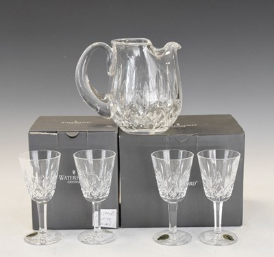 Lot 385 - Set of four Waterford crystal Lismore white wine glasses