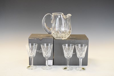 Lot 385 - Set of four Waterford crystal Lismore white wine glasses