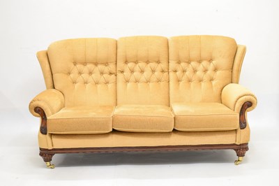 Lot 588 - Modern deep-buttoned three-seater settee, and matching chair