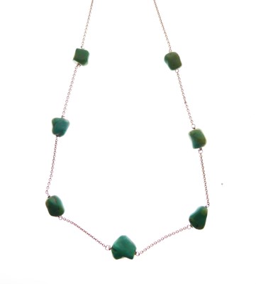 Lot 40 - '9ct' chain interspersed with seven turquoise beads
