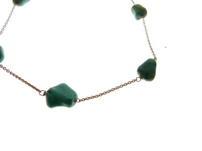 Lot 40 - '9ct' chain interspersed with seven turquoise beads