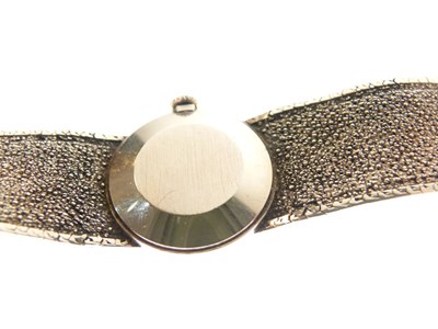 Lot 61 - Tissot- Lady's Stylist 9ct gold bracelet watch