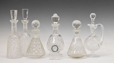 Lot 393 - Six cut glass decanters including Waterford crystal, together with a Waterford Crystal desk clock