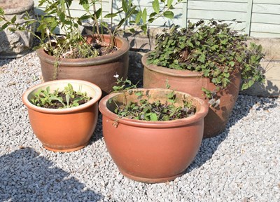 Lot 635 - Four good quality terracotta garden planters or pots