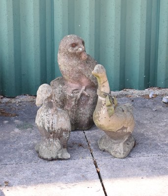 Lot 643 - Composite stone figures of an owl and two geese