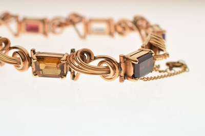 Lot 36 - Multi-gem set 18ct gold bracelet