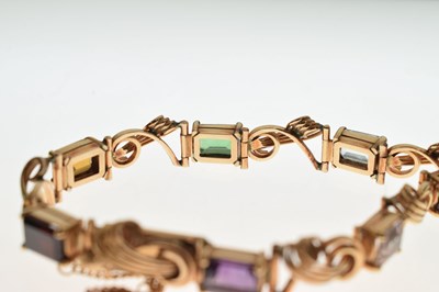 Lot 36 - Multi-gem set 18ct gold bracelet