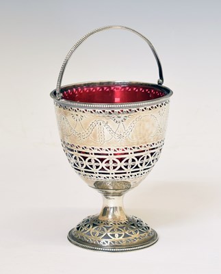 Lot 70 - George III silver pedestal sugar basket with swing handle