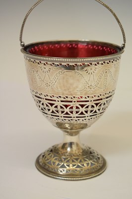Lot 70 - George III silver pedestal sugar basket with swing handle