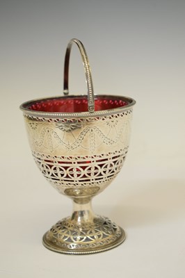 Lot 70 - George III silver pedestal sugar basket with swing handle