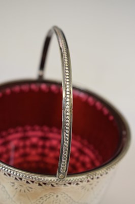 Lot 70 - George III silver pedestal sugar basket with swing handle