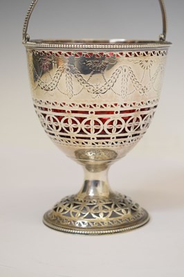 Lot 70 - George III silver pedestal sugar basket with swing handle