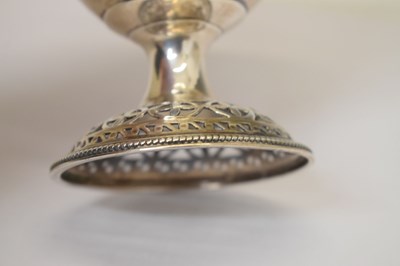 Lot 70 - George III silver pedestal sugar basket with swing handle