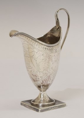 Lot 69 - George III silver helmet cream jug