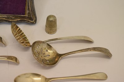 Lot 170 - Edward VII silver-wrapped perfume bottle, photo frame, thimble, assorted sifting spoons, etc