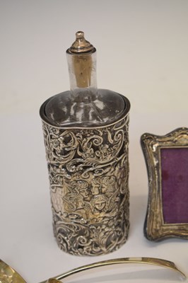 Lot 170 - Edward VII silver-wrapped perfume bottle, photo frame, thimble, assorted sifting spoons, etc