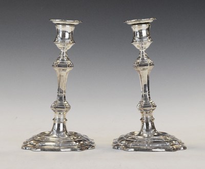 Lot 119 - Pair of 18th Century-style Edwardian silver candlesticks