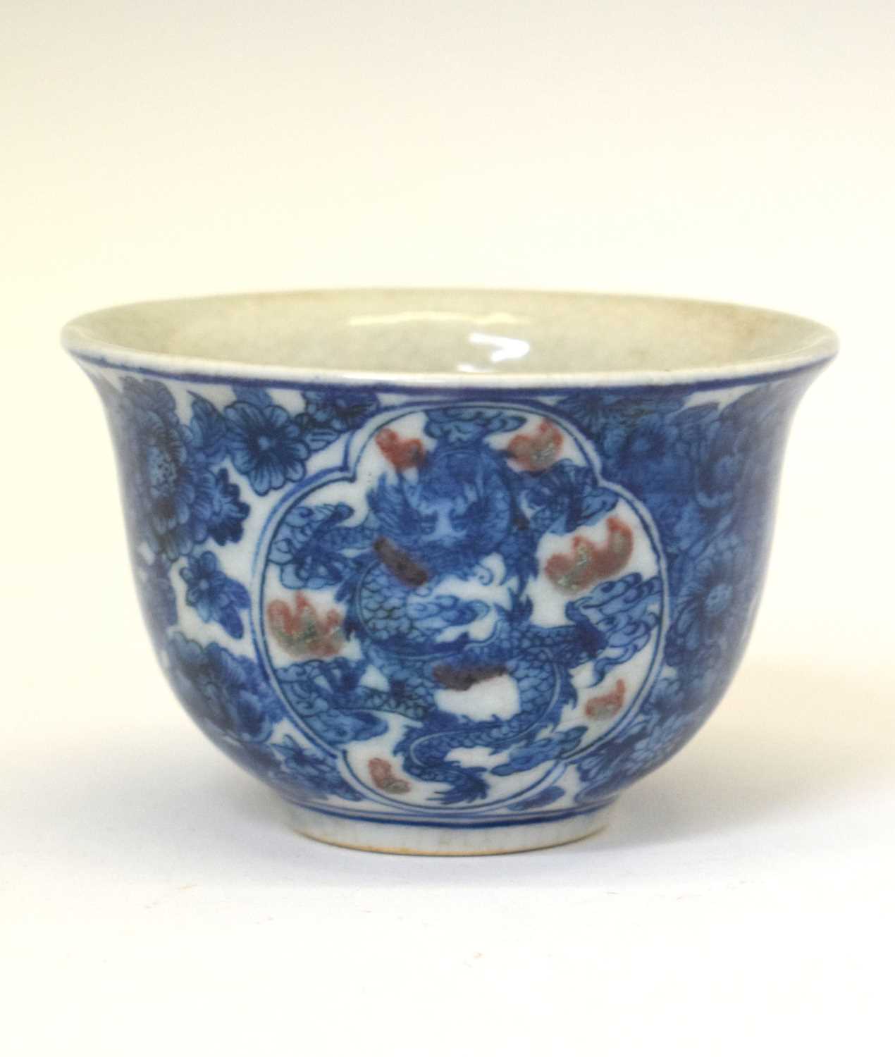 Lot 441 - Chinese porcelain blue and iron-red tea bowl, mark of Kangxi