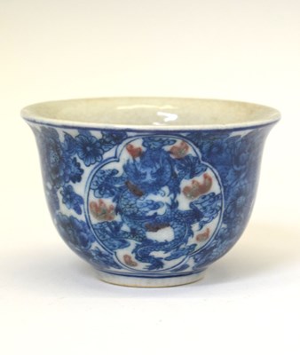 Lot 441 - Chinese porcelain blue and iron-red tea bowl, mark of Kangxi