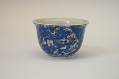 Lot 441 - Chinese porcelain blue and iron-red tea bowl, mark of Kangxi
