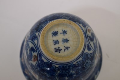 Lot 441 - Chinese porcelain blue and iron-red tea bowl, mark of Kangxi