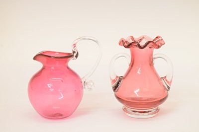 Lot 311 - Quantity of cranberry glass vases