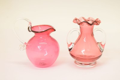 Lot 311 - Quantity of cranberry glass vases