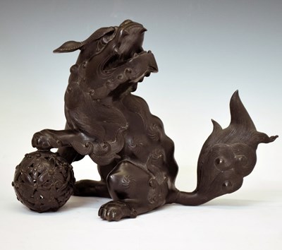 Lot 452 - Chinese bronze Dog of Fo with puzzle ball