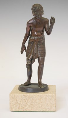 Lot 462 - Eastern bronzed figure of a beggar