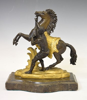 Lot 222 - Gilt and bronzed model of a Marly Horse and handler