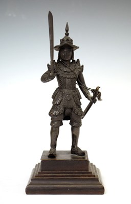 Lot 462 - South East Asian bronze figure of an armoured warrior