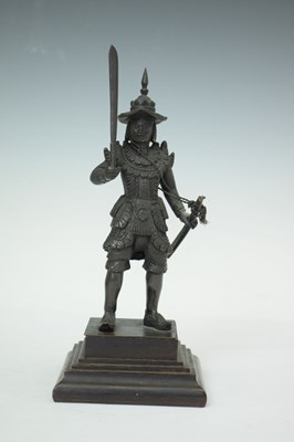 Lot 462 - South East Asian bronze figure of an armoured warrior