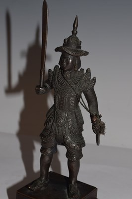 Lot 462 - South East Asian bronze figure of an armoured warrior