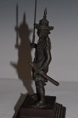 Lot 462 - South East Asian bronze figure of an armoured warrior