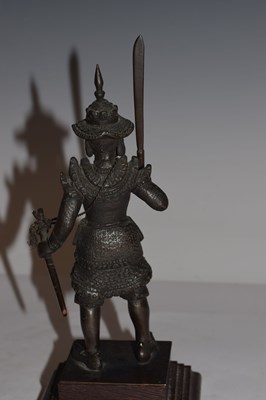 Lot 462 - South East Asian bronze figure of an armoured warrior