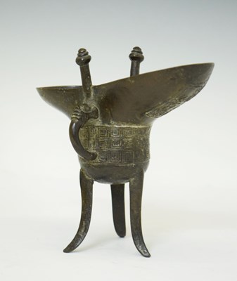 Lot 446 - Chinese bronze libation cup