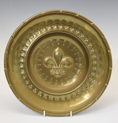 Lot 186 - Nuremberg-type brass sheet alms dish with central fleur-de-lis