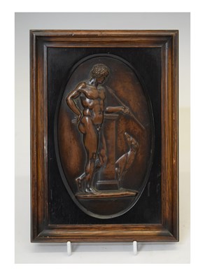 Lot 205 - Bronzed metal oval plaque - figure with dog