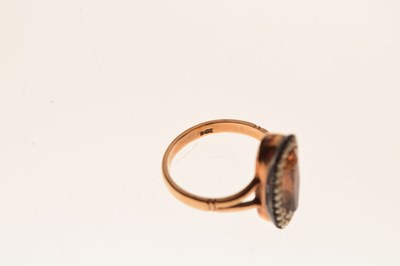 Lot 38 - '9ct' stamped yellow metal, seed pearl and brown stone ring